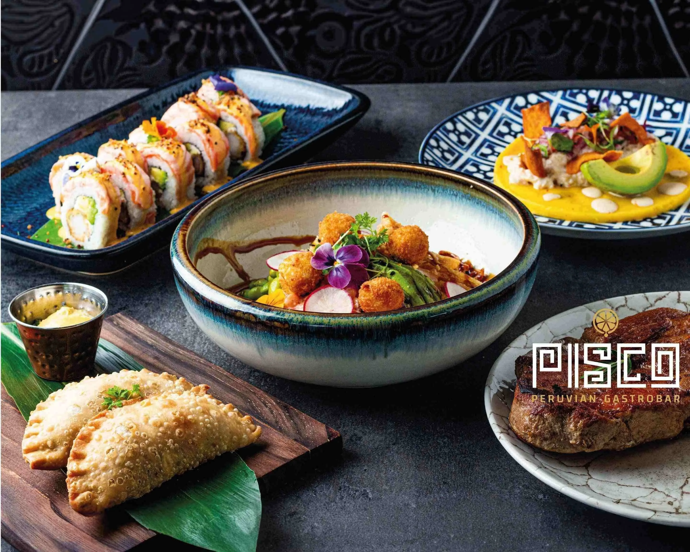 A table filled with colorful Peruvian and Nikkei dishes